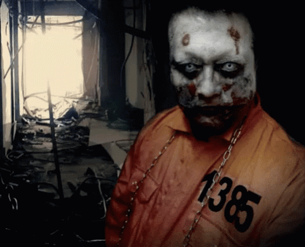Prisoner Zombie With Colorful Eyes GIF