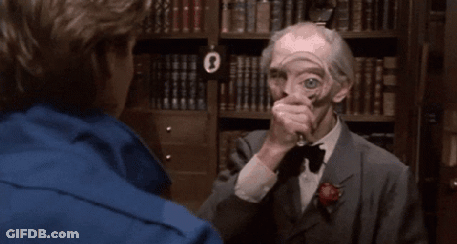 Professor With Magnifying Glass GIF