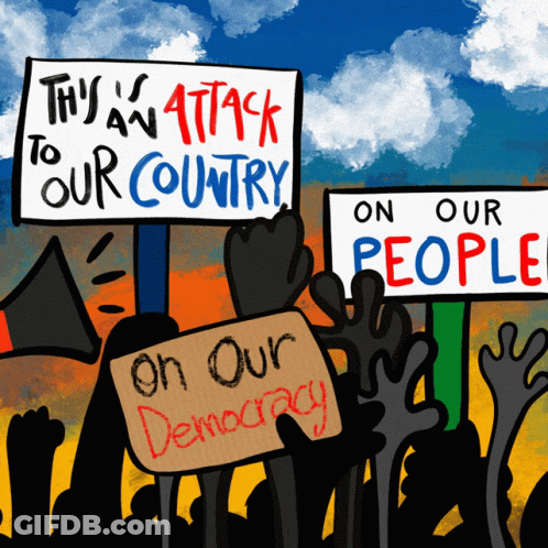 Protesters Holding Signs Saying This Is An Attack To Our Country And On Our People GIF