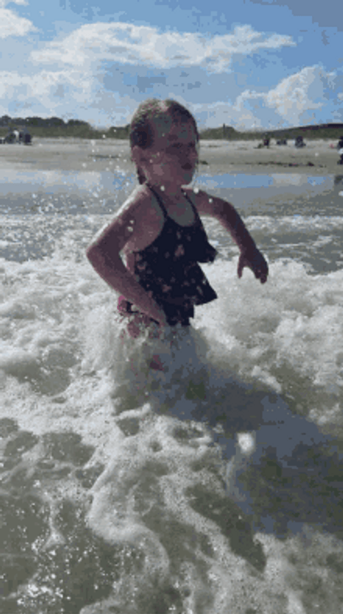Proud Kid On The Beach GIF