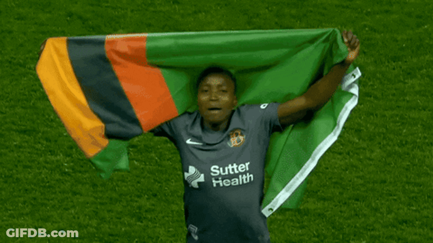 Proud Player Of Zambia Showing Off Flag GIF