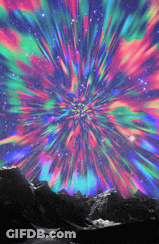 Psychedelic Mountain Range With Colorful Explosion GIF