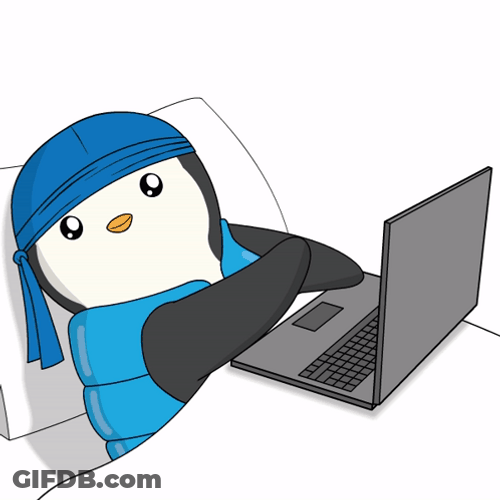 Pudgy Penguin Typing On Keyboard GIF