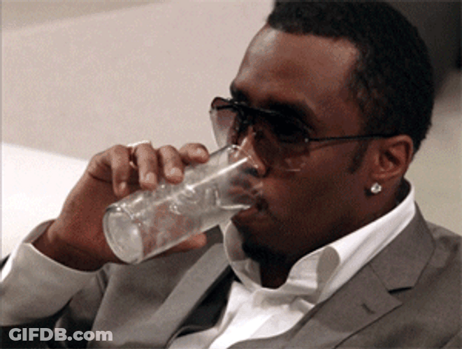 Puff Diddy Drinking Refreshment GIF
