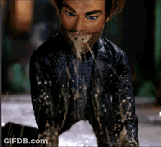 Puking Doll Guy GIF
