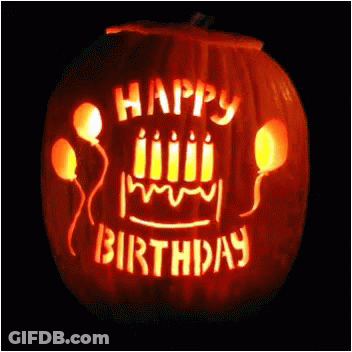 Pumpkin With Candles And Balloons Says Happy Birthday GIF