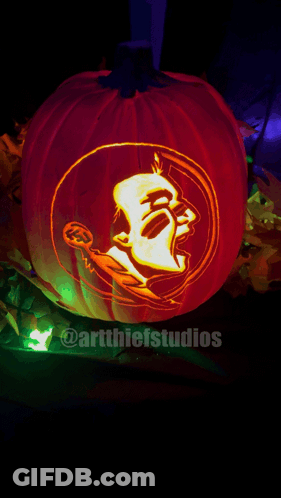 Pumpkin With Florida State Logo Carved Lit Up GIF
