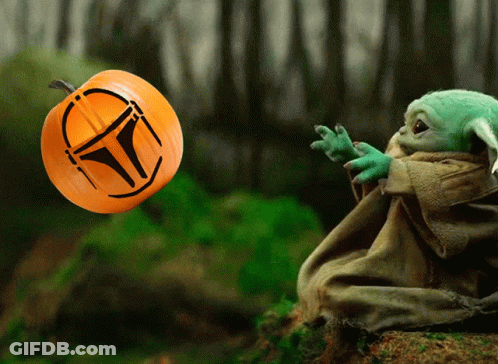 Pumpkin With Mandalorian Helmet Carved Into It GIF