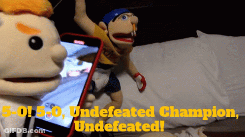 Puppet And Cell Phone Undefeated Champion GIF