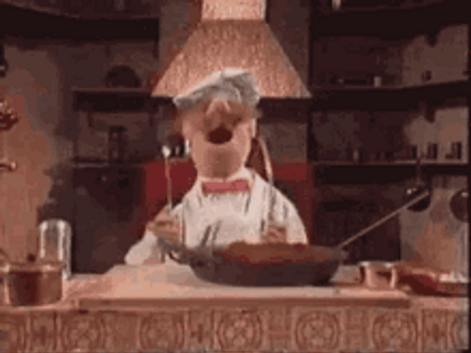 Puppet Cooking Happily GIF