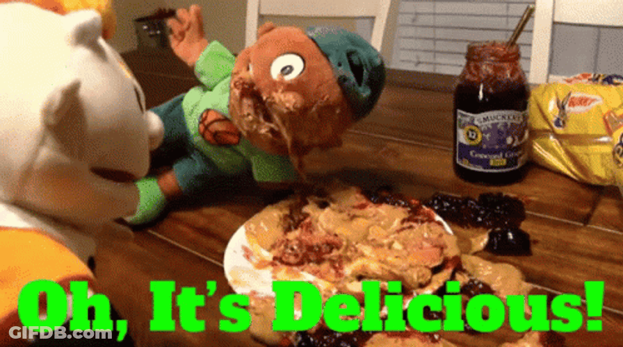 Puppet Eating Oh Its Delicious GIF