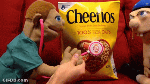 Puppet Examining Bag Of Cheerios GIF