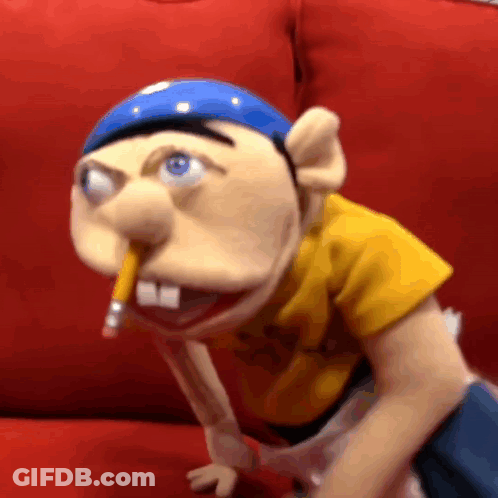 Puppet Holding Pencil In Mouth GIF