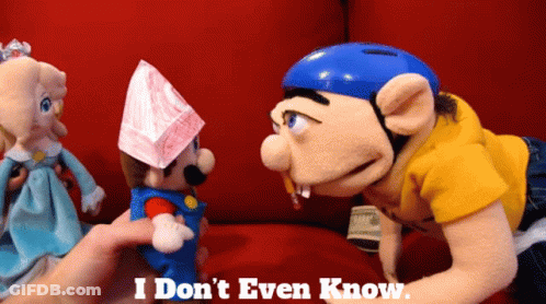 Puppet In Helmet At Desk GIF