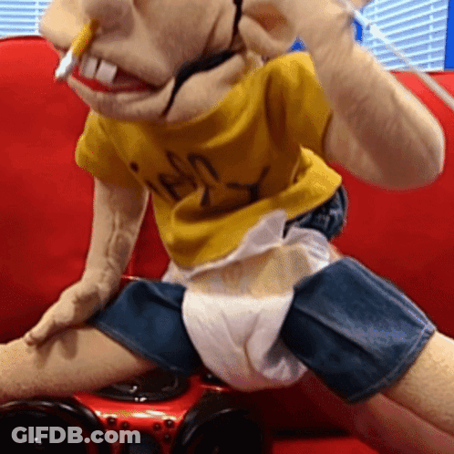 Puppet In Yellow Shirt Saying I Am A Boy GIF