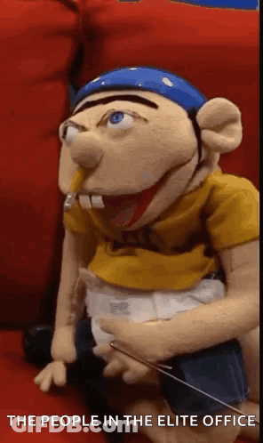 Puppet On Red Couch People In Elite Office GIF