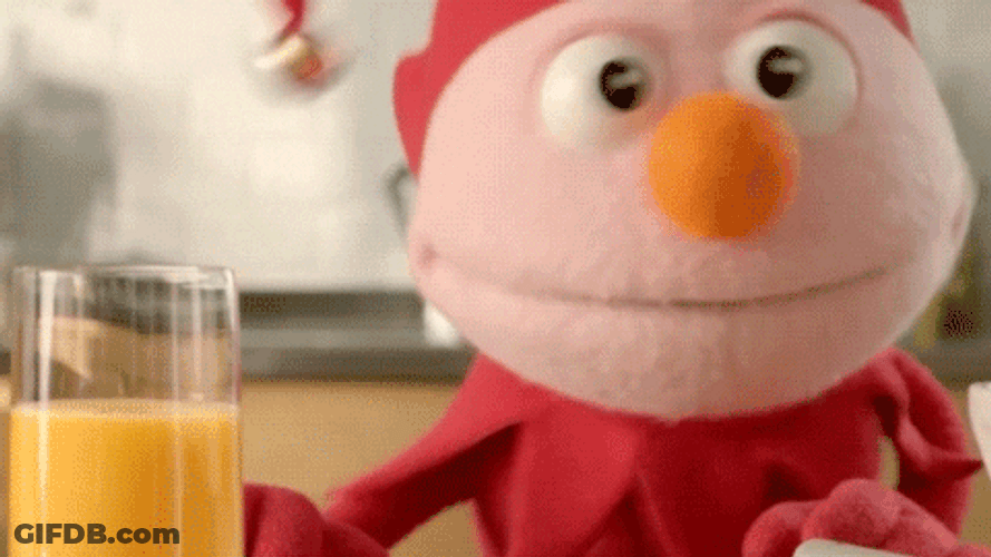 Puppet Shaking Drinking Orange Juice GIF