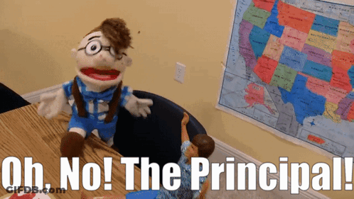 Puppet Sitting At Desk With Uh No Principal GIF