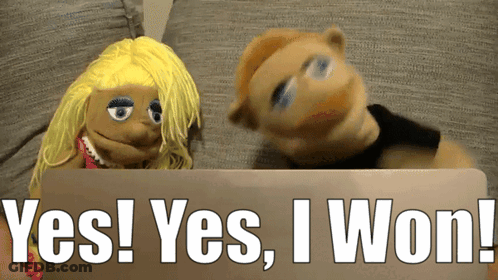 Puppet Sitting Next To Puppet Saying Yes I Won GIF