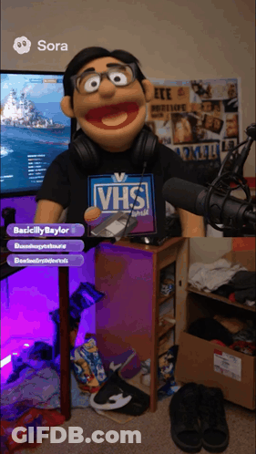 Puppet Wearing VHS Shirt GIF