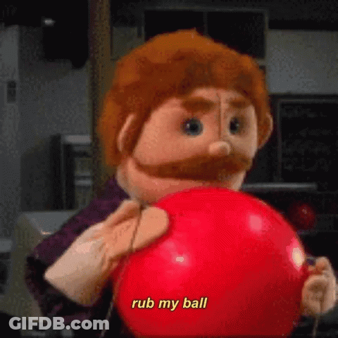 Puppet With Beard Holding Red Ball Says Rub My Ball GIF