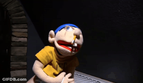 Puppet With Cigarette In Mouth Wearing Yellow Spongebob Shirt GIF