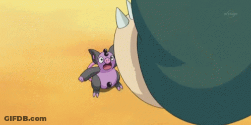 Purple And Black Cartoon Next To Large Character Tokyo GIF