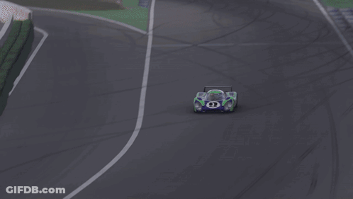 Purple And Green Race Car Number 3 GIF
