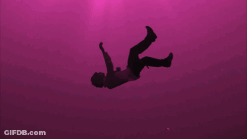 Purple Background Silhouette Falling Into Water GIF