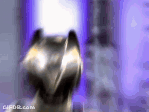 Purple Background With Statue And Blurred Background GIF
