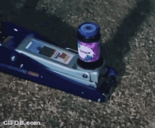 Purple Bottle Of Wipes On Blue Floor Jack GIF
