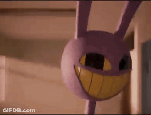 Purple Bunny With Yellow Smile Hanging From Ceiling GIF