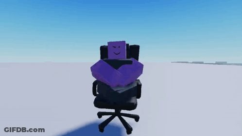 Purple Cartoon Character Sitting In Chair With Smiley Face GIF