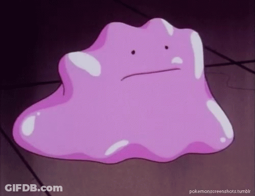 Purple Cartoon Character Sitting On Table GIF