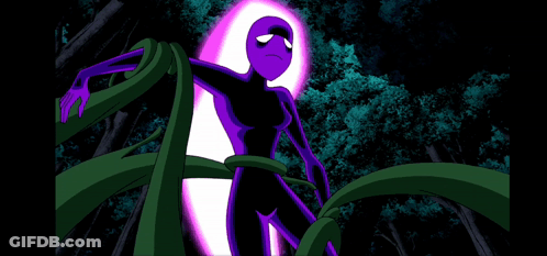 Purple Cartoon Character Surrounded By Green Vines And Trees GIF