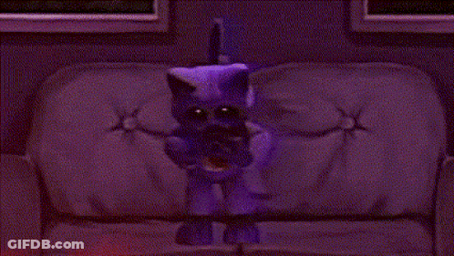 Purple Cat Standing On Couch Holding Crescent Moon GIF