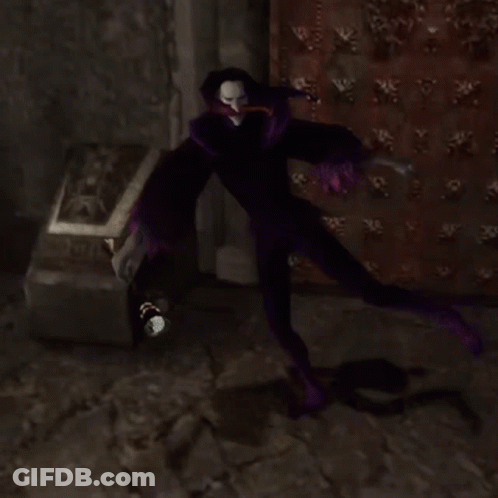 Purple Clown Lying On Floor By Red Wall GIF