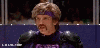 Purple Costumed Man With Mustache Before Crowd GIF