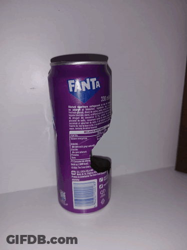 Purple Fanta Can On Table GIF