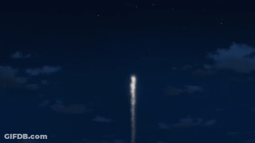 Purple Fireworks Heart Exploding In Night Sky GIF