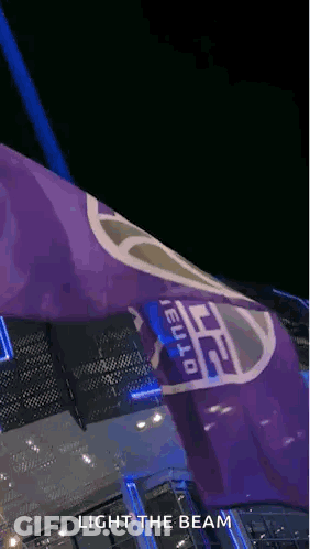 Purple Flag Saying Light The Beam GIF