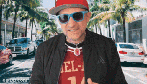 Purple Frog Sitting On Couch Holding Soda Can Purpe In South Beach GIF