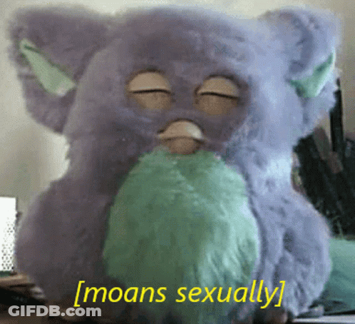Purple Furby With Green Beard Moans Sexually GIF