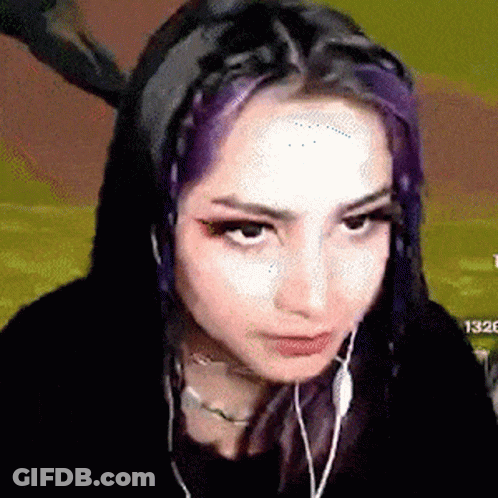 Purple Hair Girl Making Face With Headphones GIF