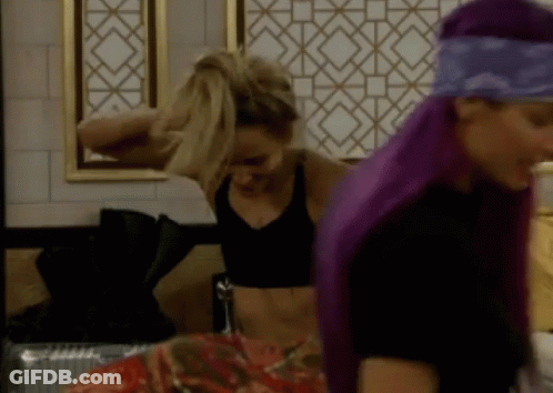 Purple Hair Woman Next To Blonde Hair Woman GIF