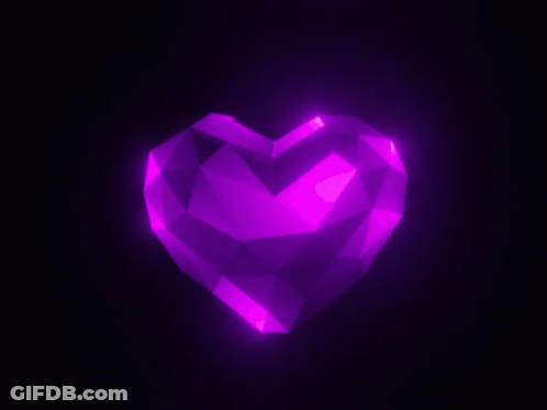 Purple Heart With Glowing Eyes Floating In Dark GIF