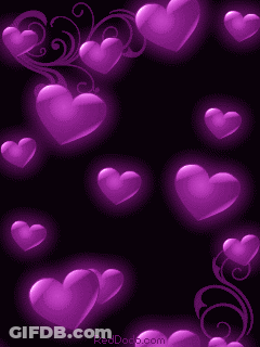 Purple Hearts On A Black Background With The Website Reddoo.com In The Corner GIF