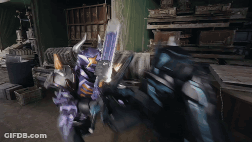 Purple Horned Robot Fighting Blue Robot GIF