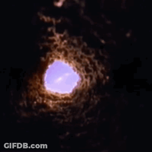Purple Light Shining Through Hole In Ground GIF