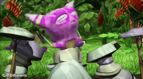 Purple Monster Standing On Rock GIF